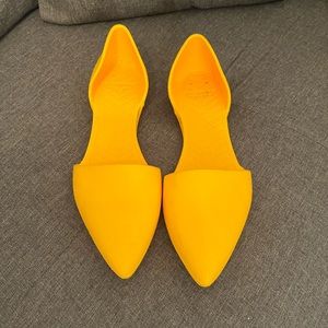 yellow rain shoes. Worn once. Brand is “native”